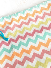 detailed photo of the bright colored chevron striped project bag