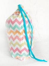 side view of the bag in use cinched at the top for easy travel