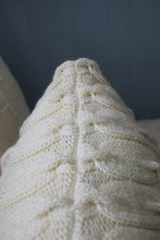 neatly knit seam finishing of the top of the cable knit sham