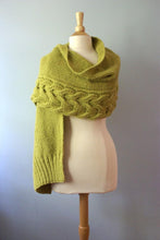 chunky aspen wrap shown in a mustard acre color as a wrap or shawl