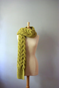 chunky aspen wrap being worn as a scarf thrown over your shoulder