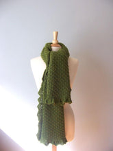 green Dublin wrap worn as a generously sized scarf