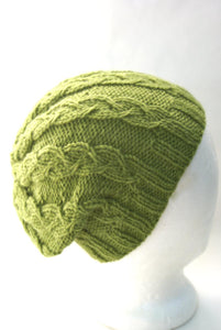 unisex cable knit hat pattern showing it worn slouchy