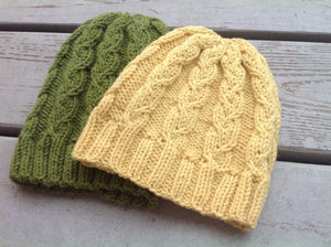 able knit hat shown in yellow and green 